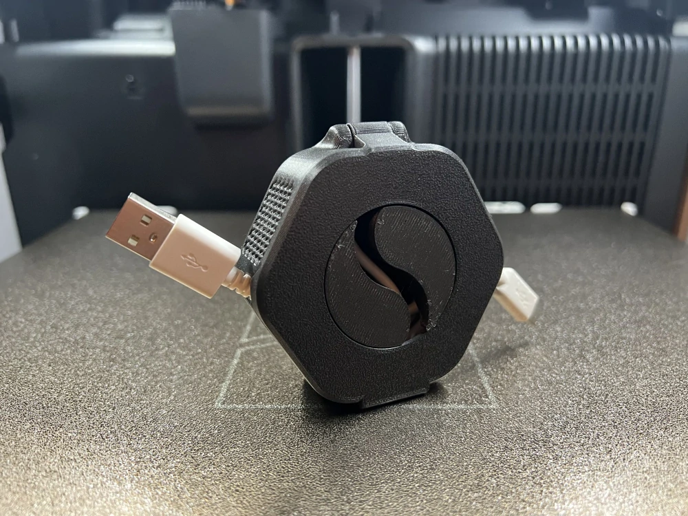 Naviják na kabely a sluchátka – 3D tištěný organizér (70 × 28 mm)